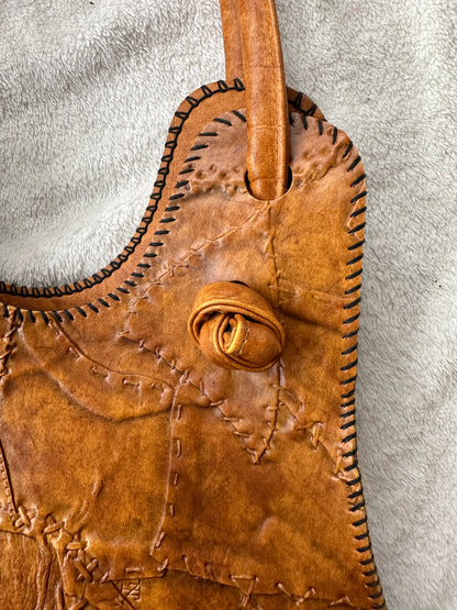 1970s Tooled Leather Patchwork Saddlebag